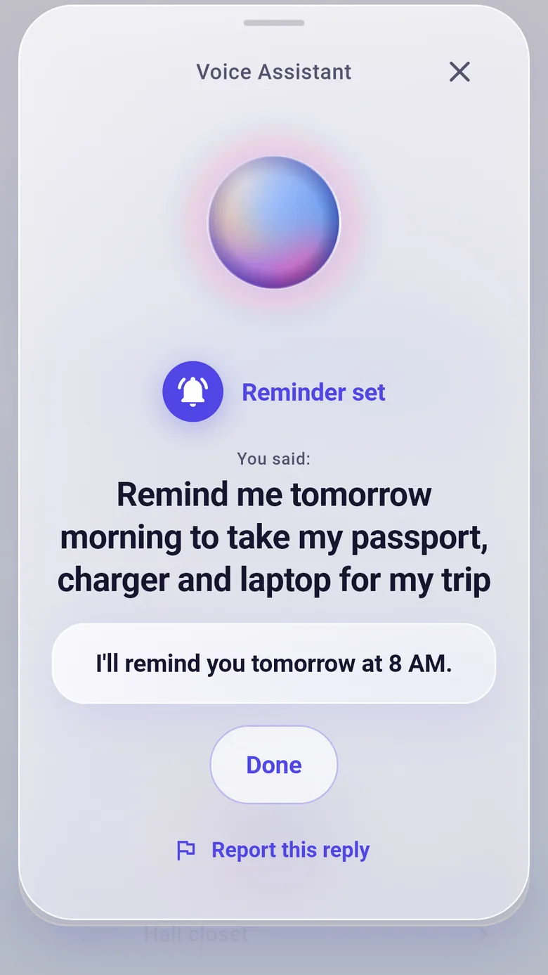 KnowWhere setting a reminder you asked for by voice, and answering: I'll remind you tomorrow at 8 AM.
